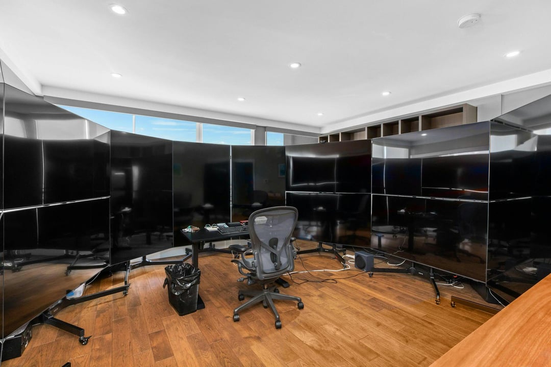 Was browsing homes and saw this. What do you think this person does?